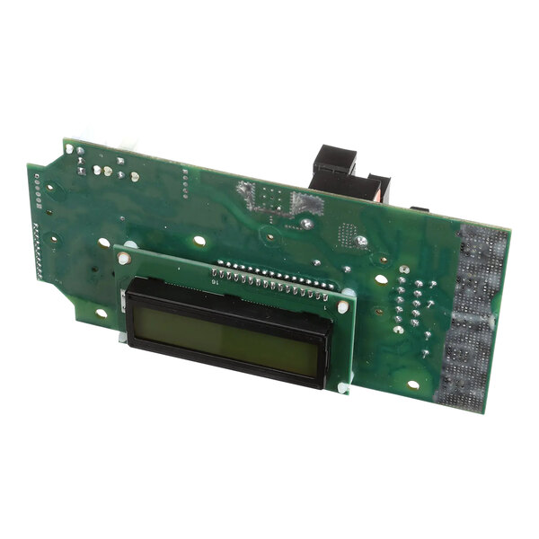 A green circuit board with a black display.
