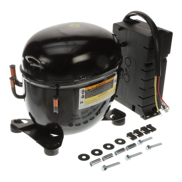 A black Traulsen air compressor with screws and wires.