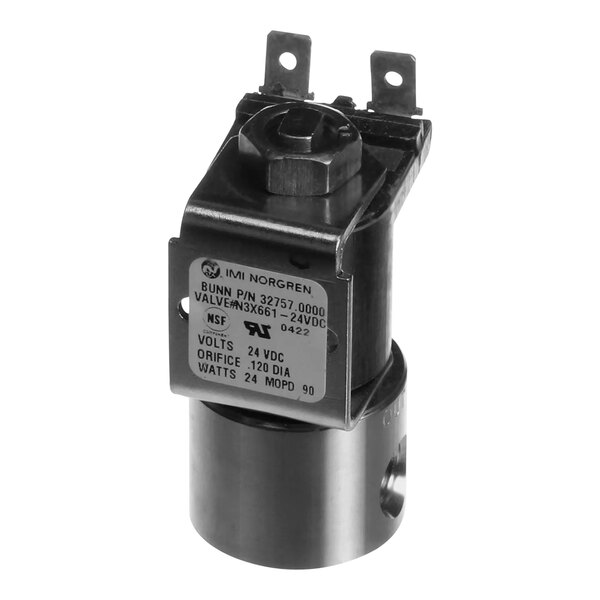 A close-up of a black metal Bunn water valve assembly.