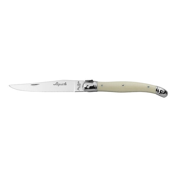 A Jean Dubost Laguiole stainless steel steak knife with a silver and ivory handle.