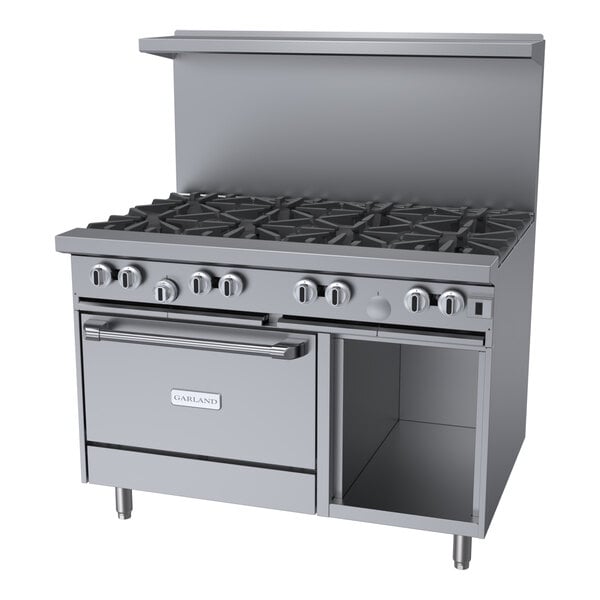 A commercial stainless steel 8-burner gas range with a convection oven and storage base.