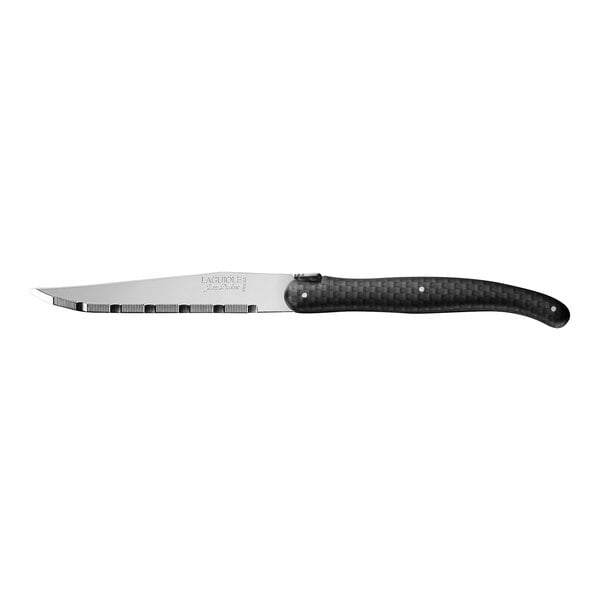 A Jean Dubost Laguiole steak knife with a black matte carbon handle and serrated stainless steel blade.