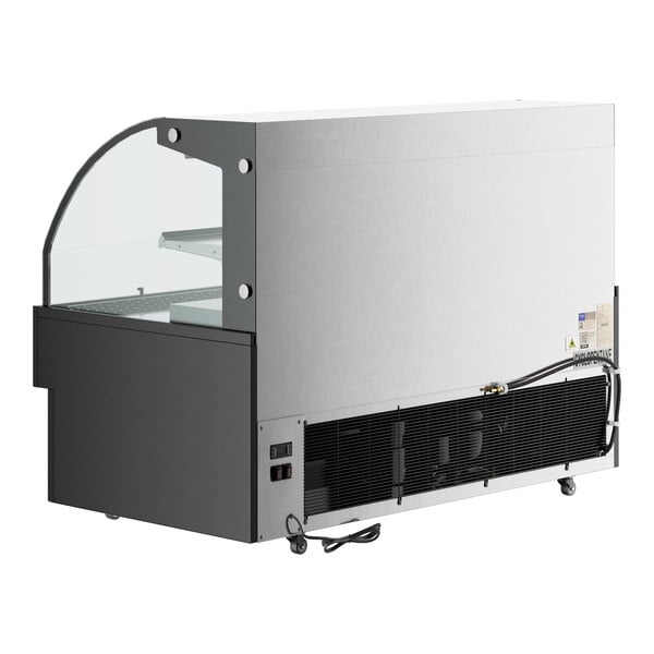 An Avantco black horizontal air curtain merchandiser with LED lighting and a glass door.