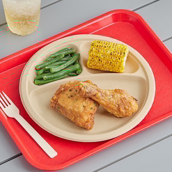 A tray with 3 Tellus natural bagasse plates of food on it.