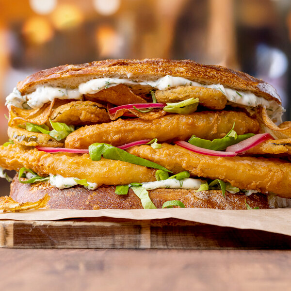 A close-up of Mrs. Friday's Craft Beer Battered Pollock Fillet portions.