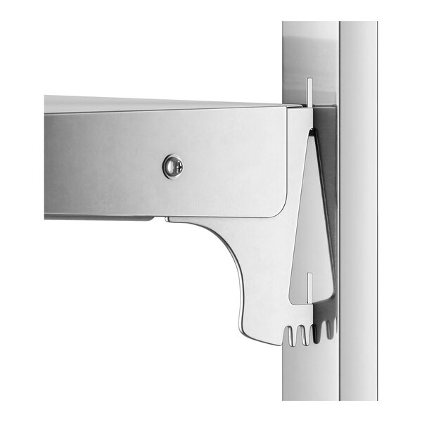 A metal shelf inside a white Avantco air curtain merchandiser.