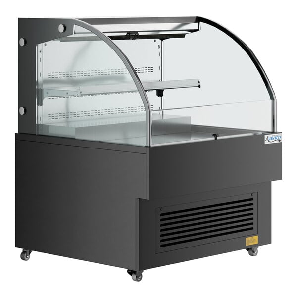 An Avantco black horizontal air curtain merchandiser with LED lighting and a glass door.