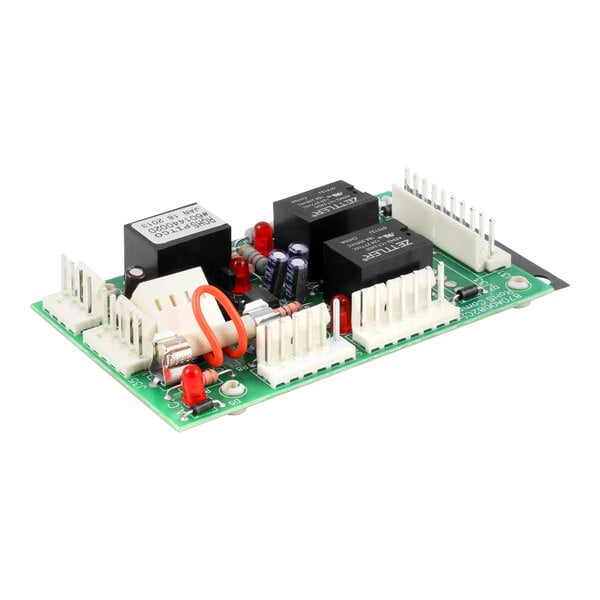 A green Pitco relay board with white and red components.