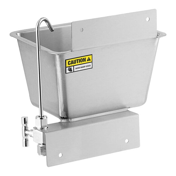 A stainless steel Regency ice cream dipper well with a faucet and a metal container with a hook.