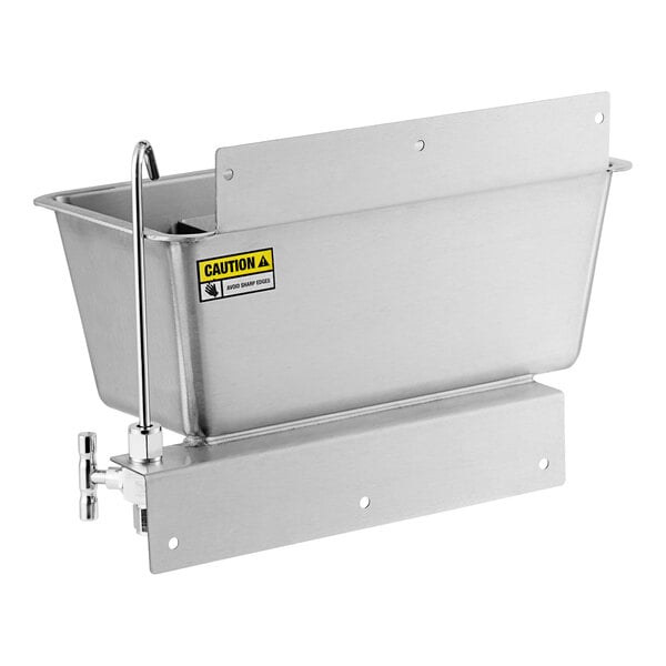 A Regency stainless steel ice cream dipper well with a faucet on a counter.