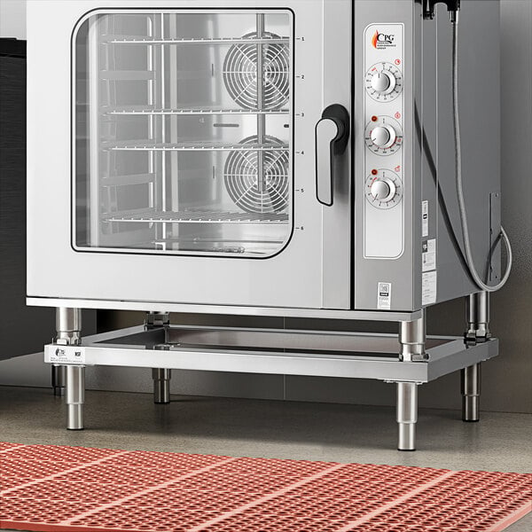 A Cooking Performance Group low-profile stand with a red mat under a combi oven.