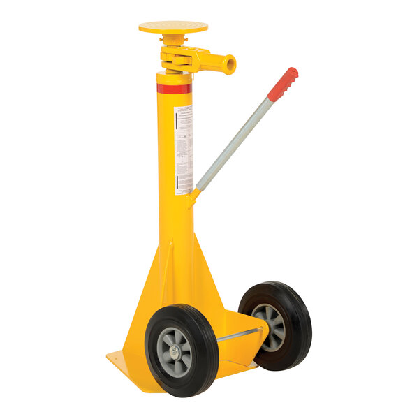 A yellow pole with a black wheel.