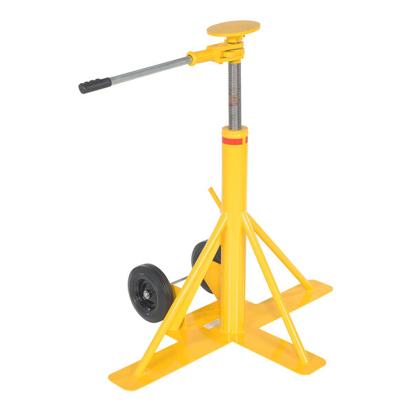 A yellow Vestil Big Foot stabilizing jack with wheels.