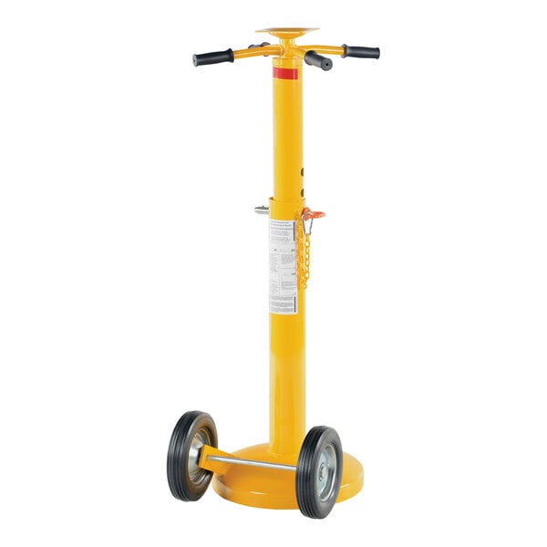 A yellow steel trailer stabilizing jack with rubber wheels.
