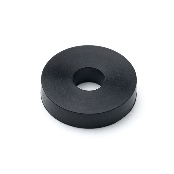 A black rubber seat washer with a white center in a black circle.