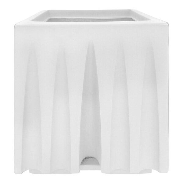 A black square planter with a square hole in the top.