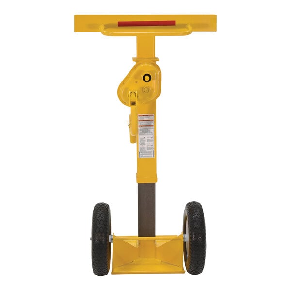 A yellow Vestil steel stabilizing jack with foam wheels.