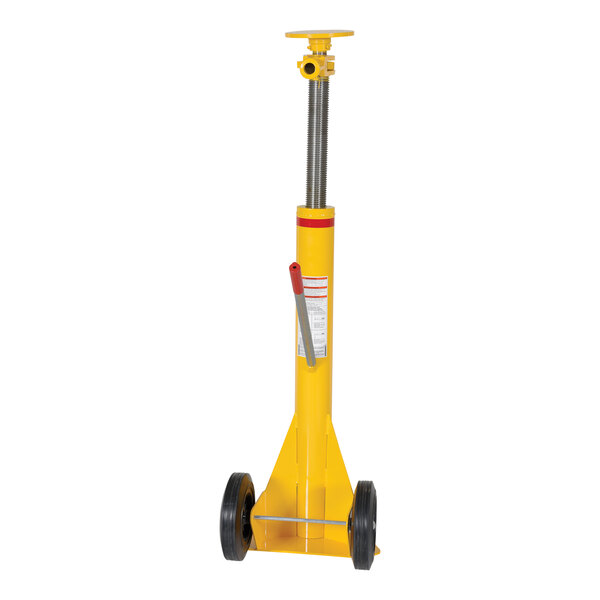 A yellow cylinder with a red handle.