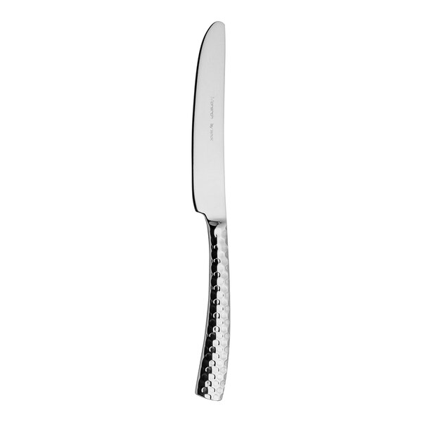 A WNK Monarch stainless steel butter knife with a textured silver handle.