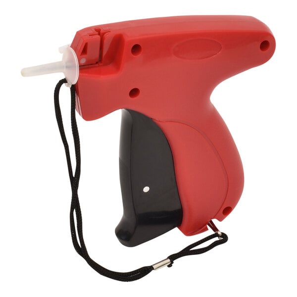 A red and black fine fabric tagging gun with a needle attached to it.