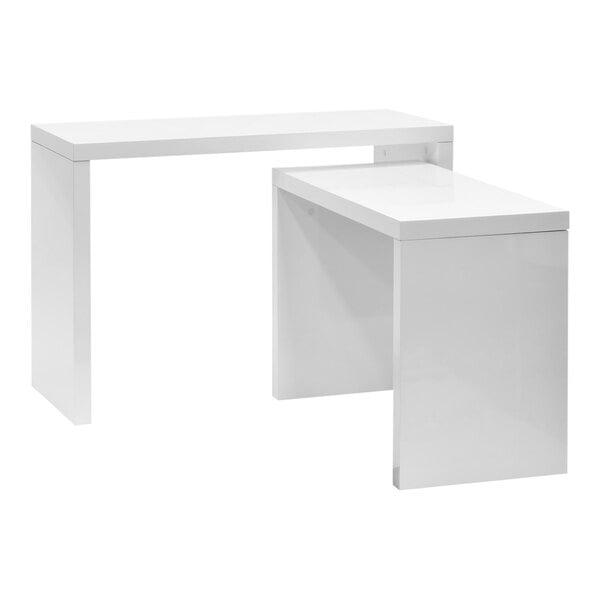 A glossy white nesting table set with a white surface and white frame.