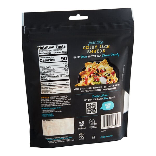 A black package of Violife Just Like Colby Jack Vegan Cheese Shreds with a label.