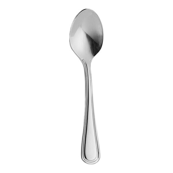 A close-up of a WNK Contour stainless steel demitasse spoon with a white background.