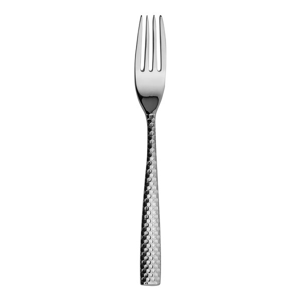 A close up of a silver WNK Monarch dinner fork with a white background.