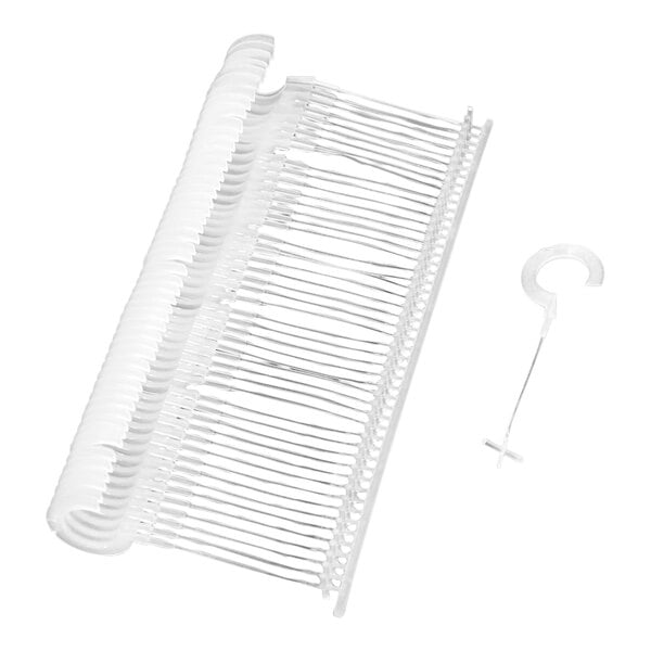 A group of 2" clear plastic standard price tag fasteners with hooks.