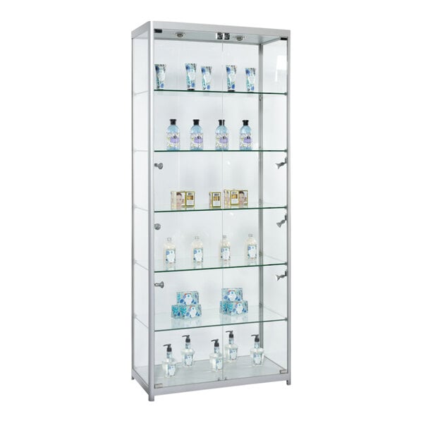 A 31 1/2" x 15 1/2" Glass Display Showcase with Bottles of Liquid on Shelves.