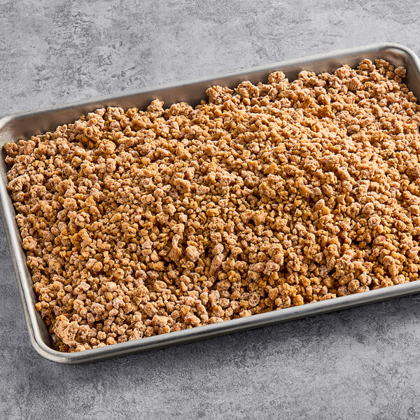 A tray of Gardein Plant-Based Vegan Italian Pizza Crumbles on a table.