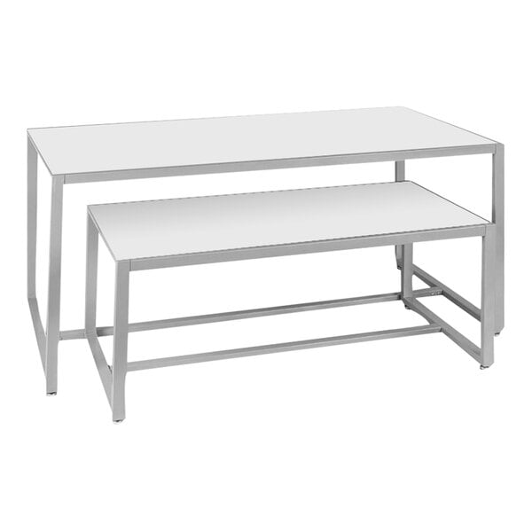 A 2-piece white table set with white melamine top on a table.