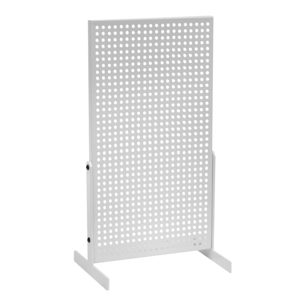 A white rectangular steel pegboard with holes.