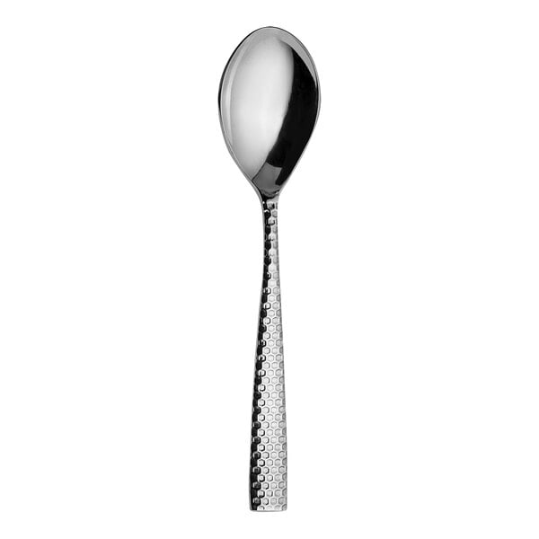 A WNK Monarch stainless steel serving spoon with a textured handle.