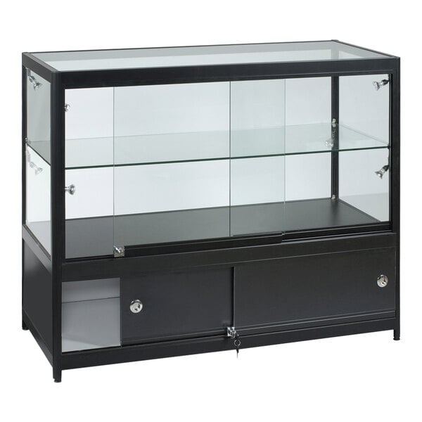 A black display showcase with glass shelves and sliding doors.