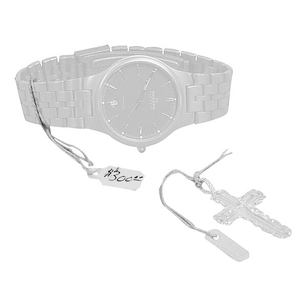 A silver watch with a white strung price tag.