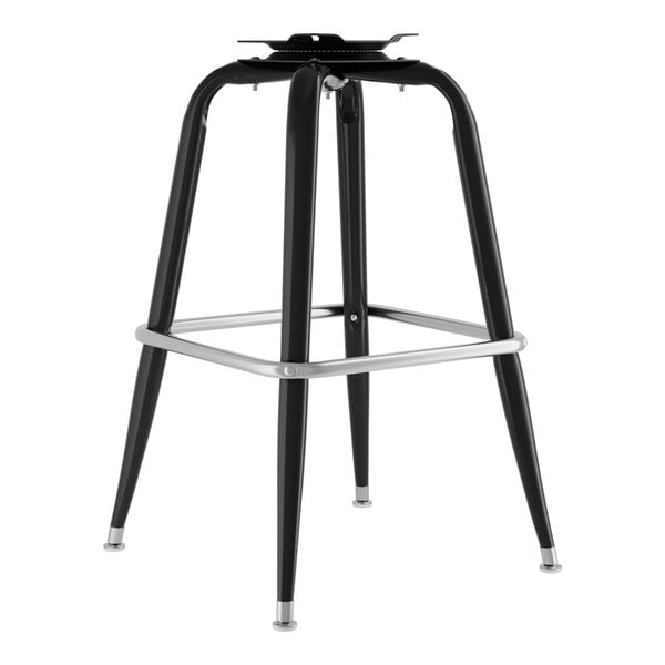 A black Lancaster Table & Seating bucket barstool frame with metal legs.