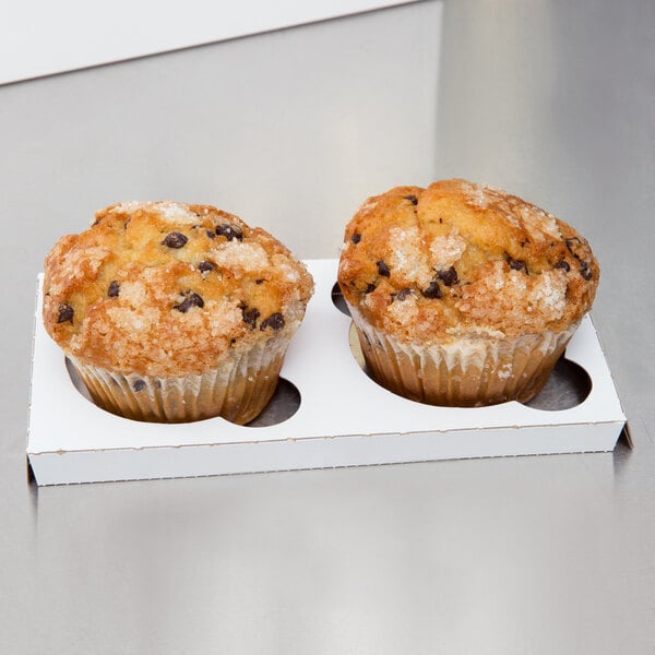 A white Baker's Lane box with a reversible cupcake insert holding two muffins.