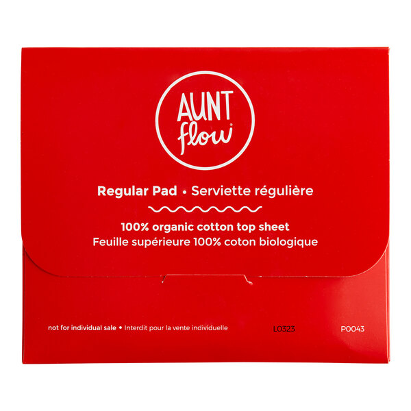 A red package of Aunt Flow regular organic cotton menstrual pads with white text.