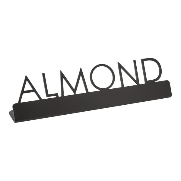 A black stainless steel table sign with "Almond" laser-cut letters.