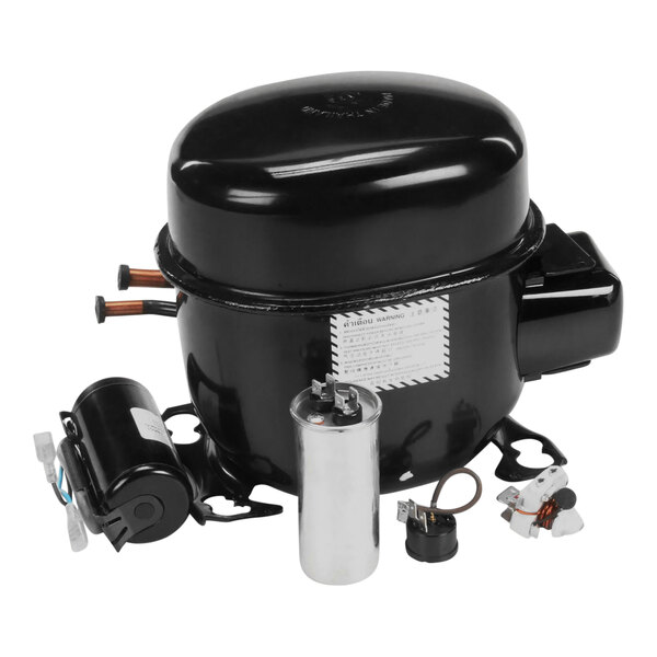 A black and silver Turbo Air Refrigeration compressor.