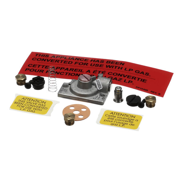 A Pitco natural to propane gas valve conversion kit on a counter with components.