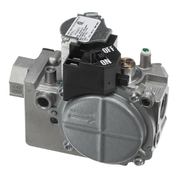 A silver metal Vulcan gas valve with a black and white label.