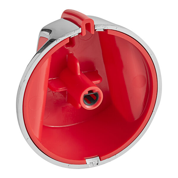 A red and white plastic Vulcan knob with a silver insert and a hole in it.