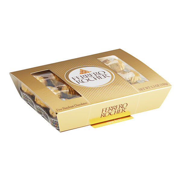 A white box of FERRERO ROCHER chocolates with gold packaging.