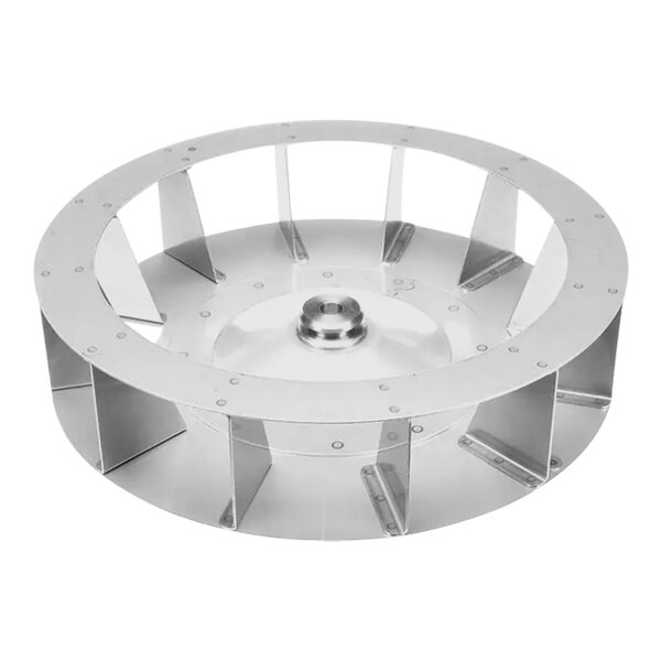 A round metal Vulcan blower wheel with holes in it.