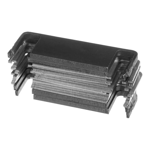 A stack of black metal rectangular caster shims.