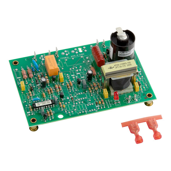 A green circuit board with many different components.