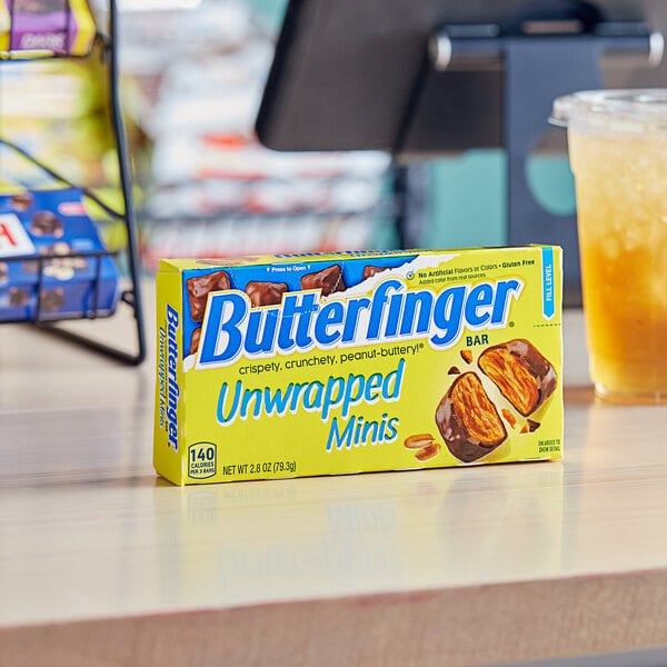 A box of BUTTERFINGER Minis on a table.