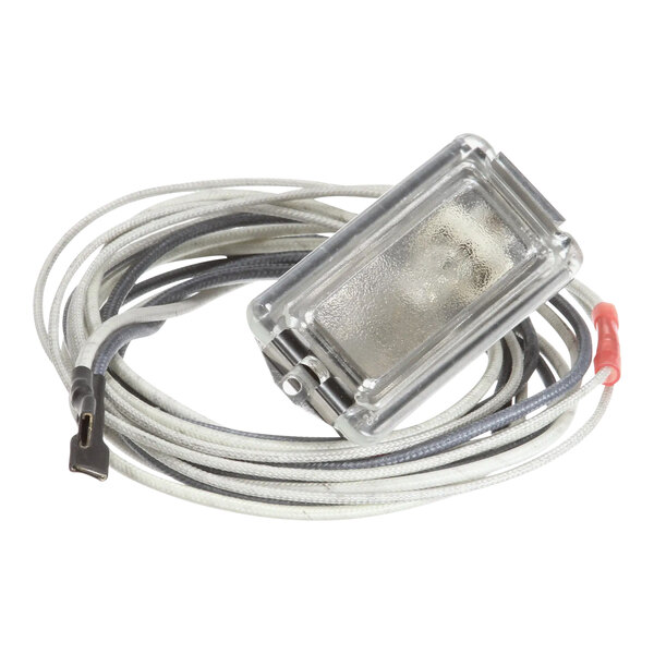 The interior light cable for an Imperial Range oven with a white and silver connector.